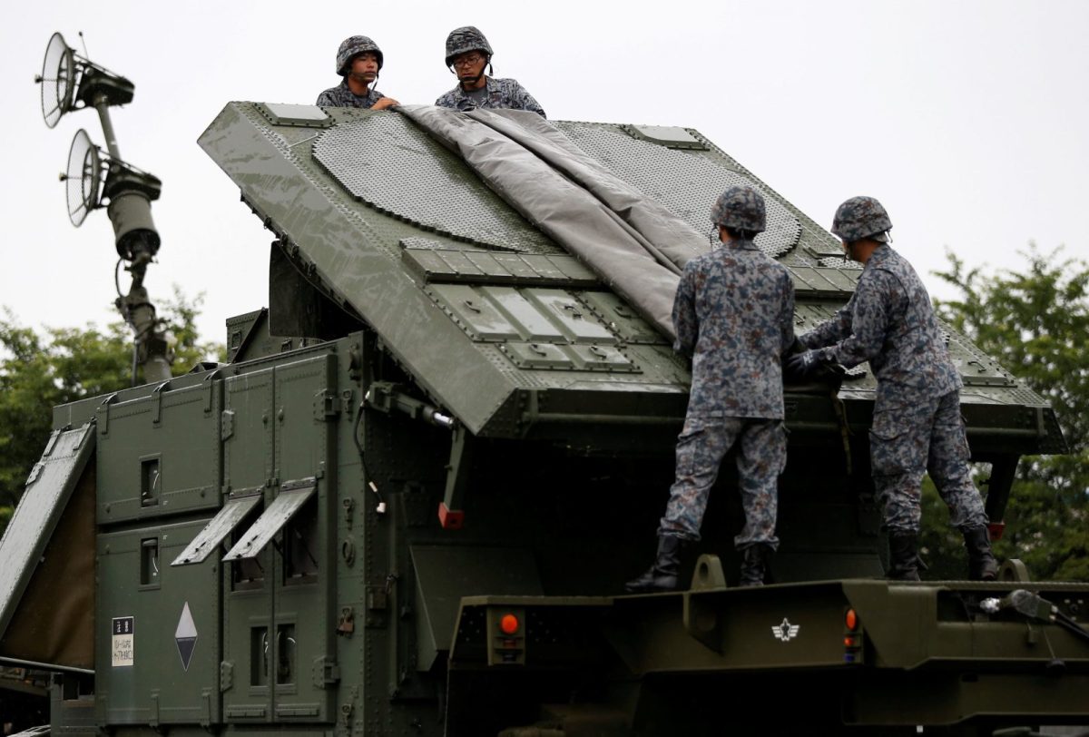 Just right: Japan Self-Defense Forces (JSDF) soldiers position the PAC-3 missile unit. Photo: Reuters/Issei Kato