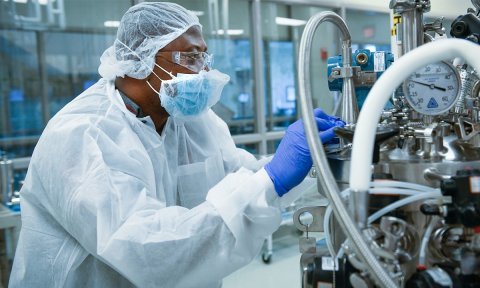 Photo of a man wearing PPE in a lab. Photo provided by North Carolina State University