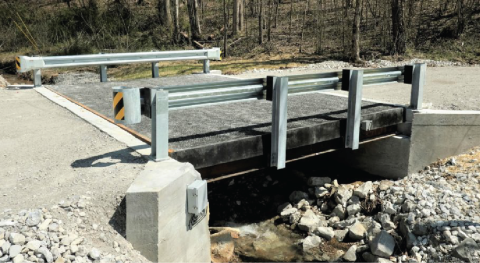 Photo of a high-tech bridge in north-central Tennessee that is equipped with a fiber-reinforced polymer (FRP) composite material bridge deck embedded with fiber optic sensors.